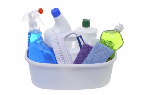 Cleaner carrying out a careful risk-assessed cleaning task